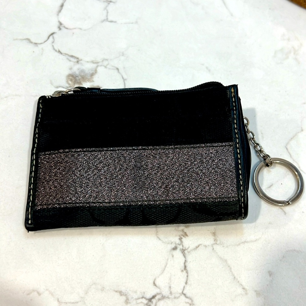 Used black COACH money/card holder.